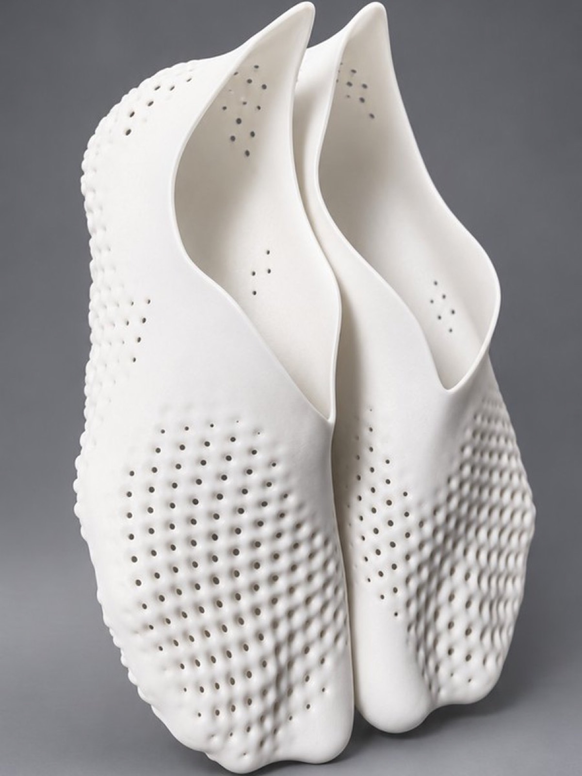 Perforated white slip-on shoe