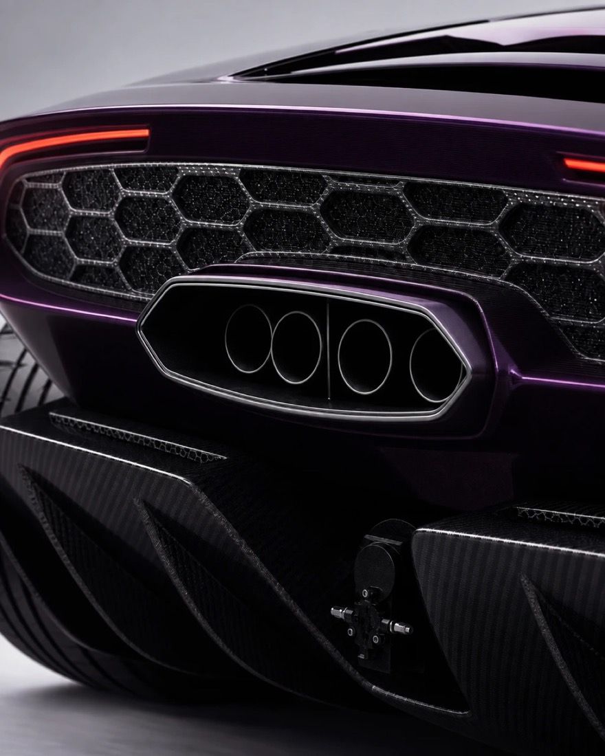 Rear grille and exhaust surround