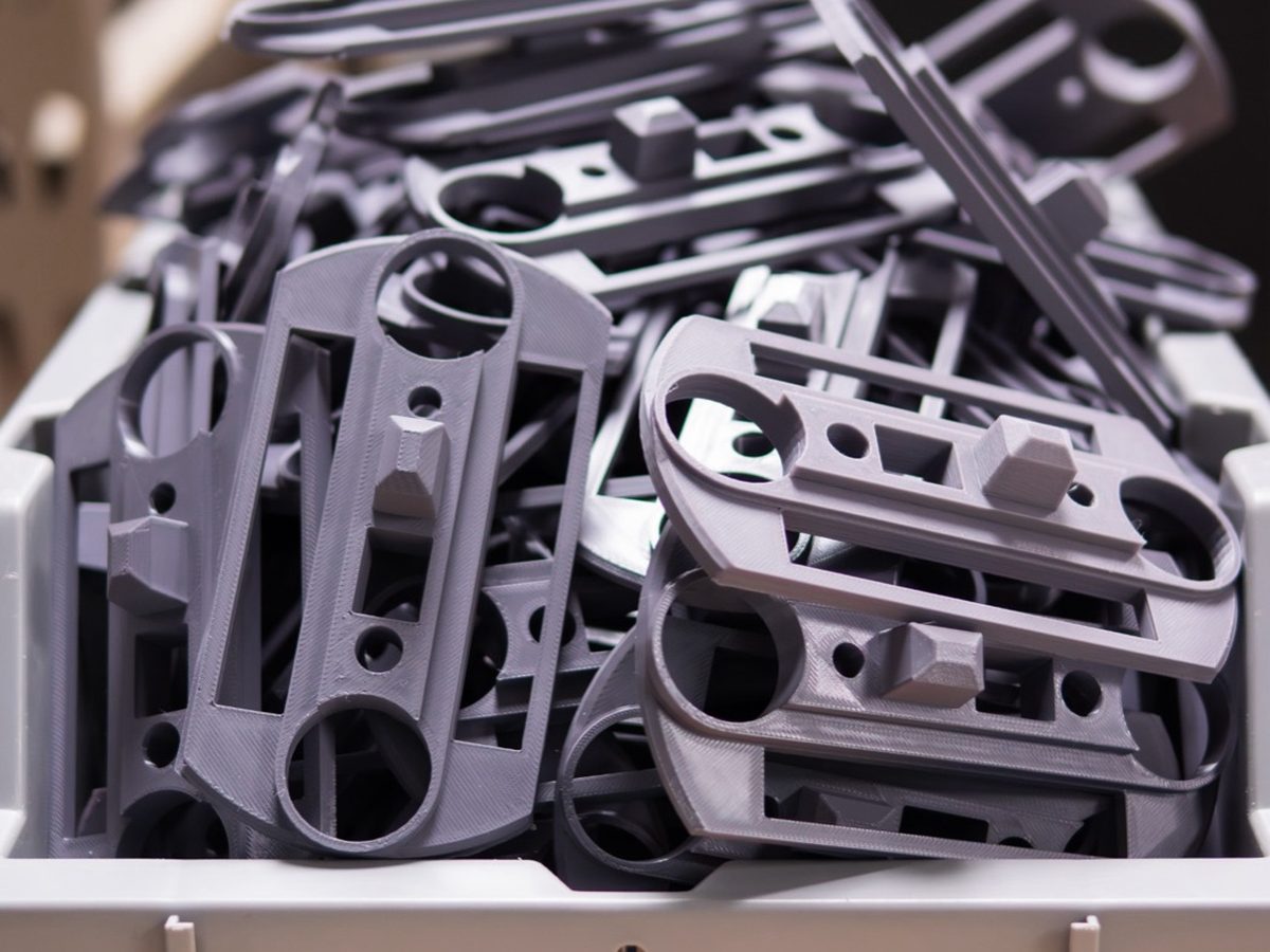 Bin of printed prototype parts