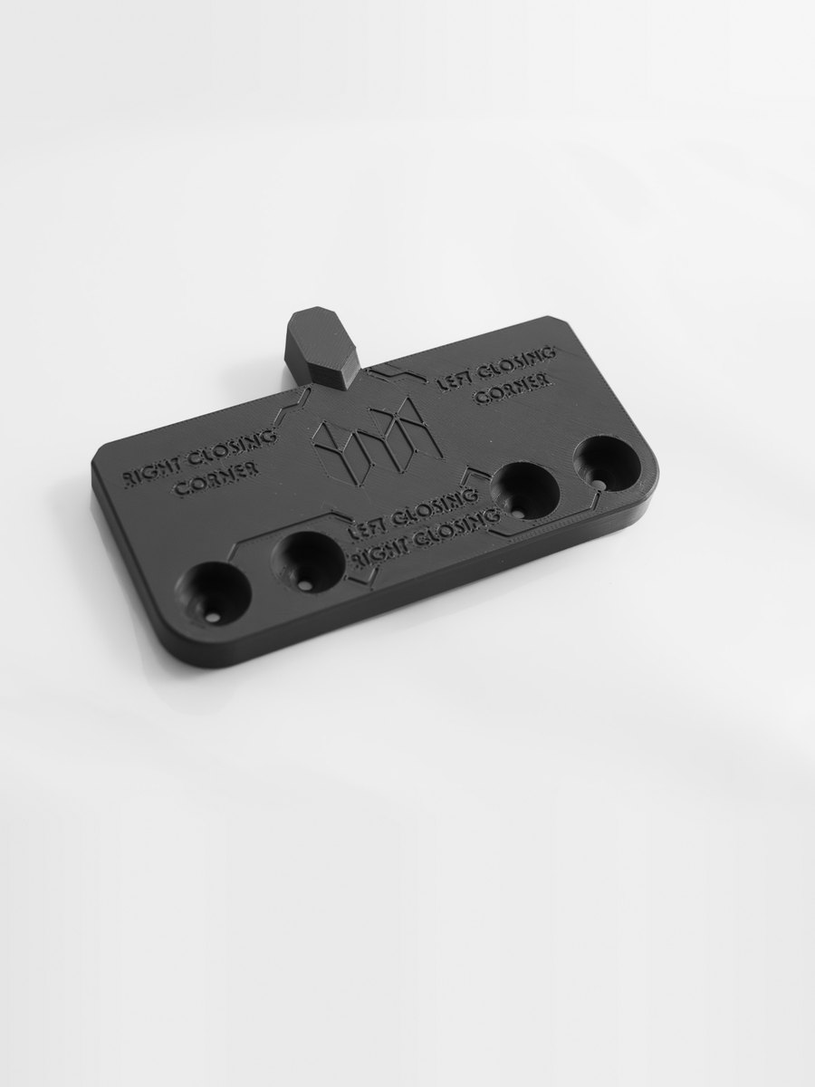 Drill jig with left and right closing-corner labels printed in