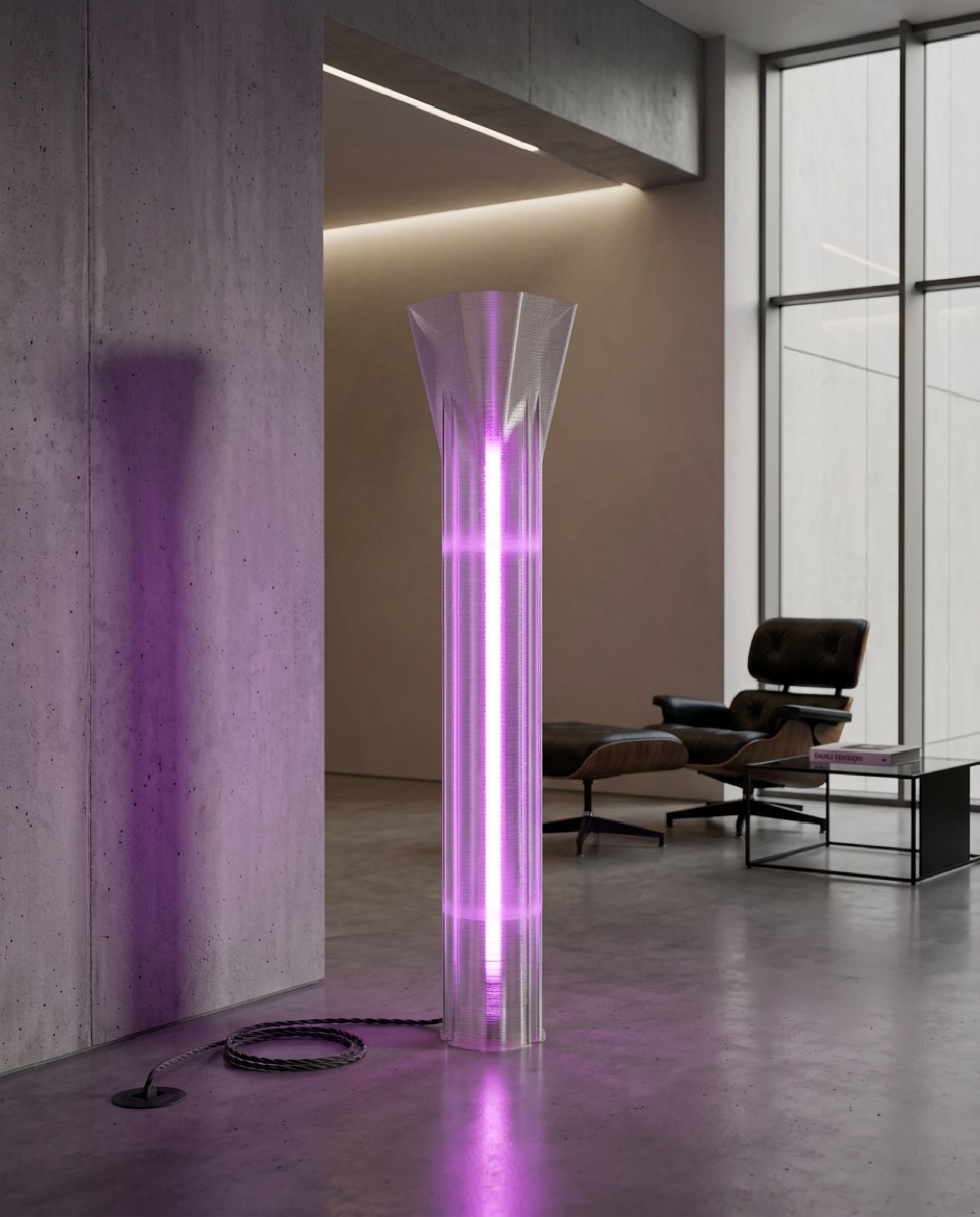 A clear printed floor lamp glowing purple in a concrete loft