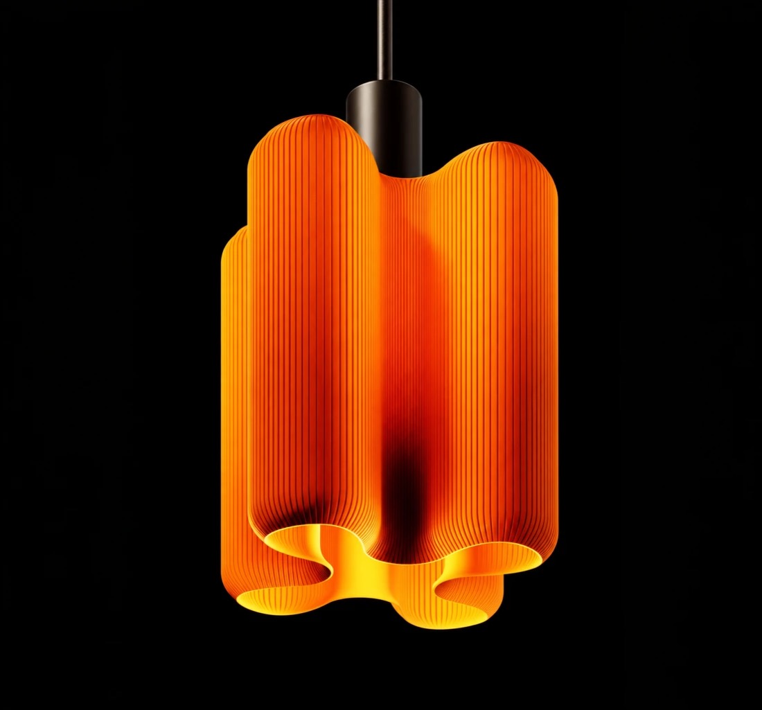 A glowing orange printed pendant lamp