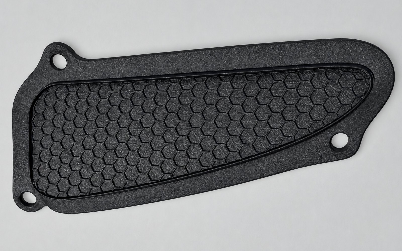 Grey nylon vent panel with an integrated hexagonal surface pattern