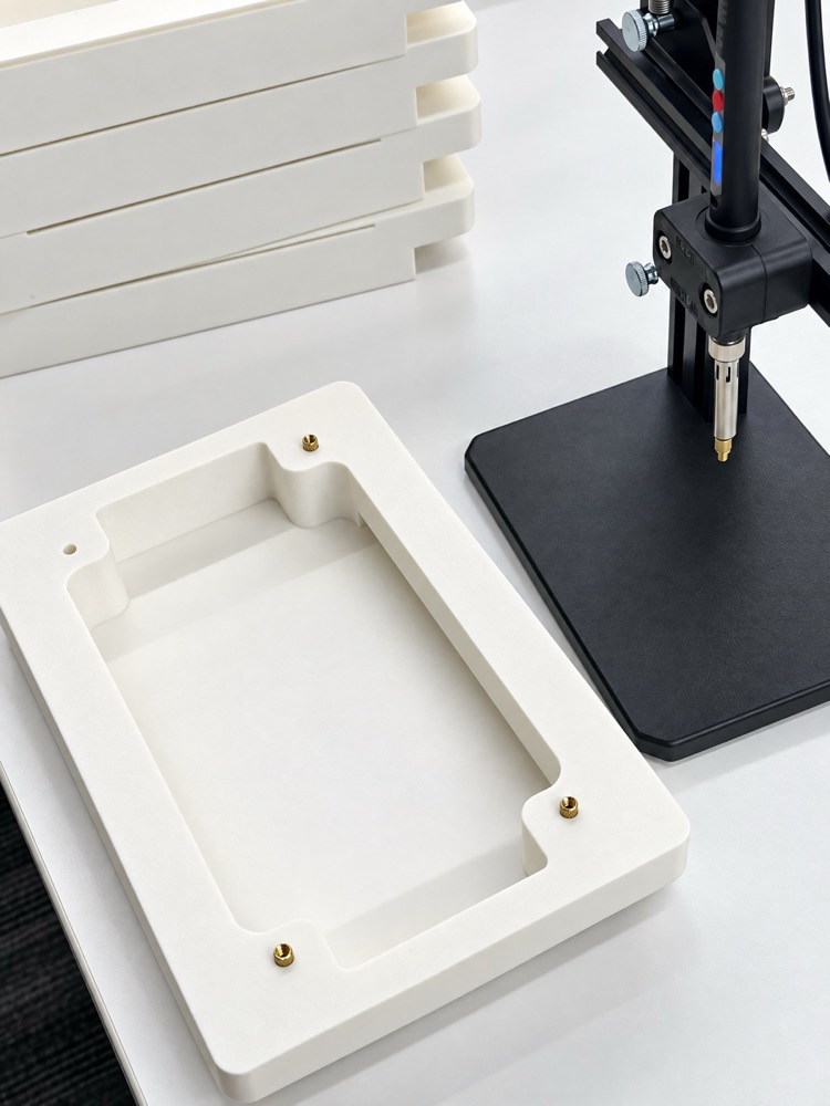 Fixture tray with brass inserts