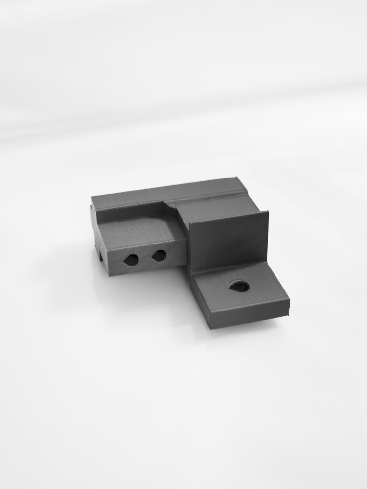 A printed partition corner bracket