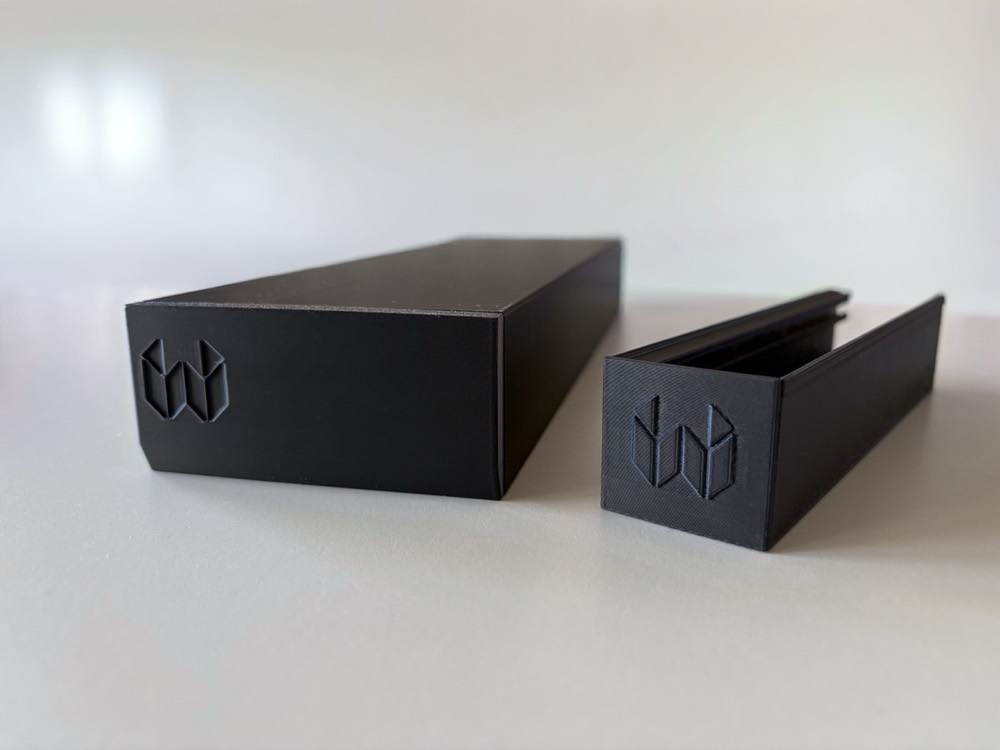 Black printed enclosures with the logo printed in