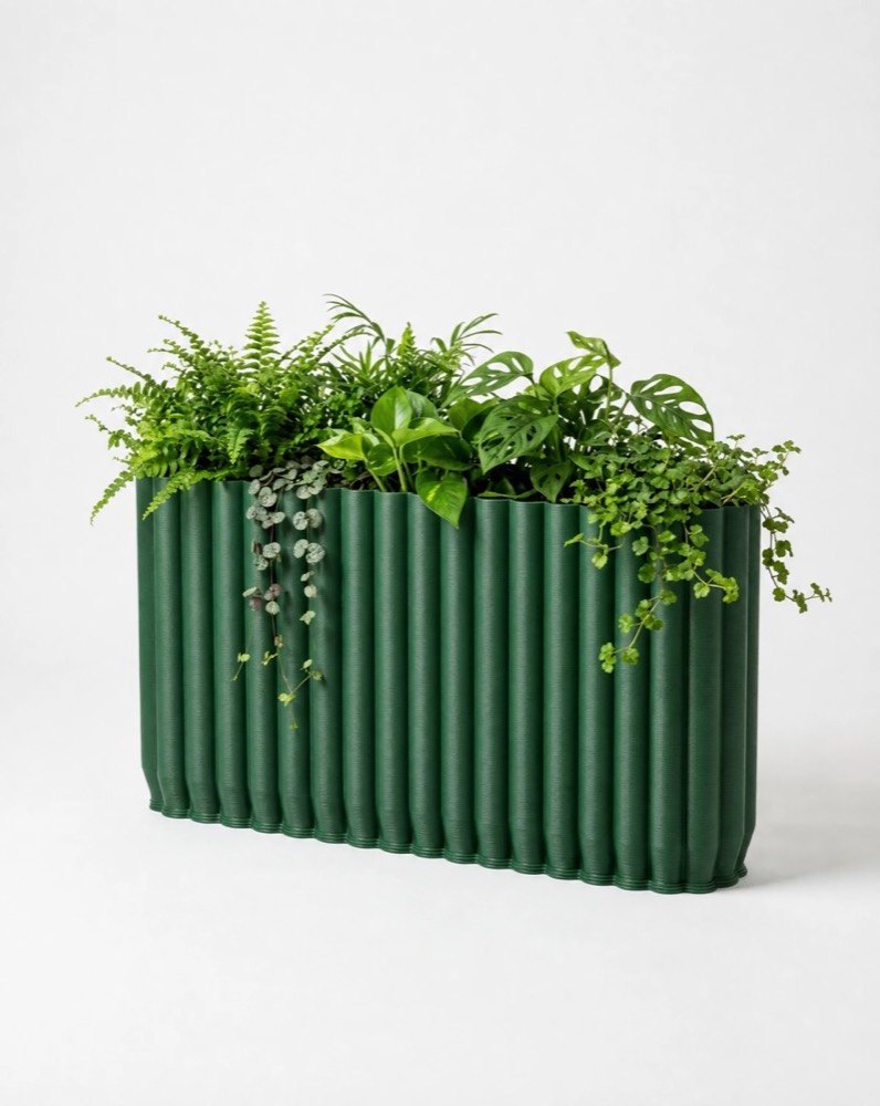 A ribbed green printed planter