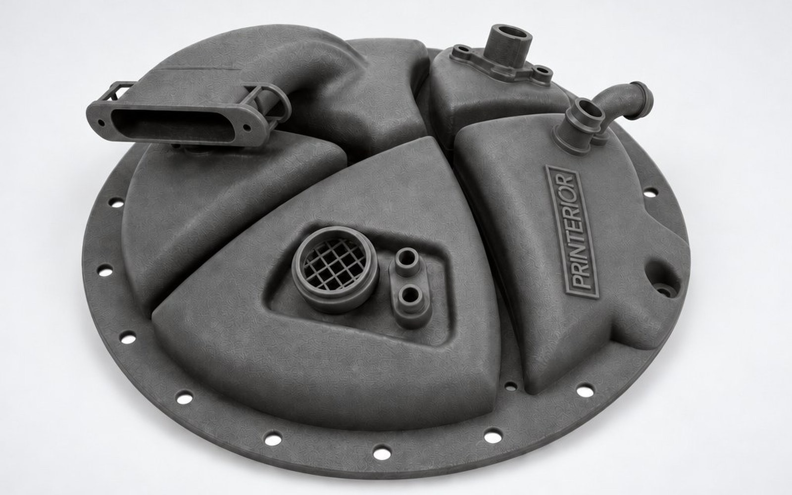 Grey nylon mechanical housing with raised logos integrated into its surface